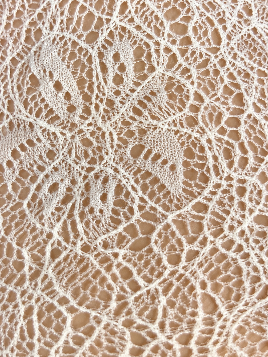 Maglia pizzo asimmetrica