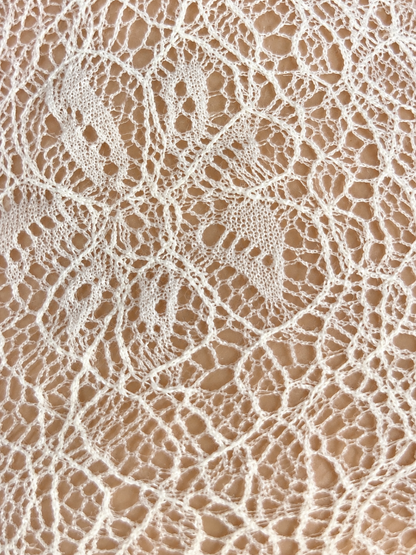 Maglia pizzo asimmetrica